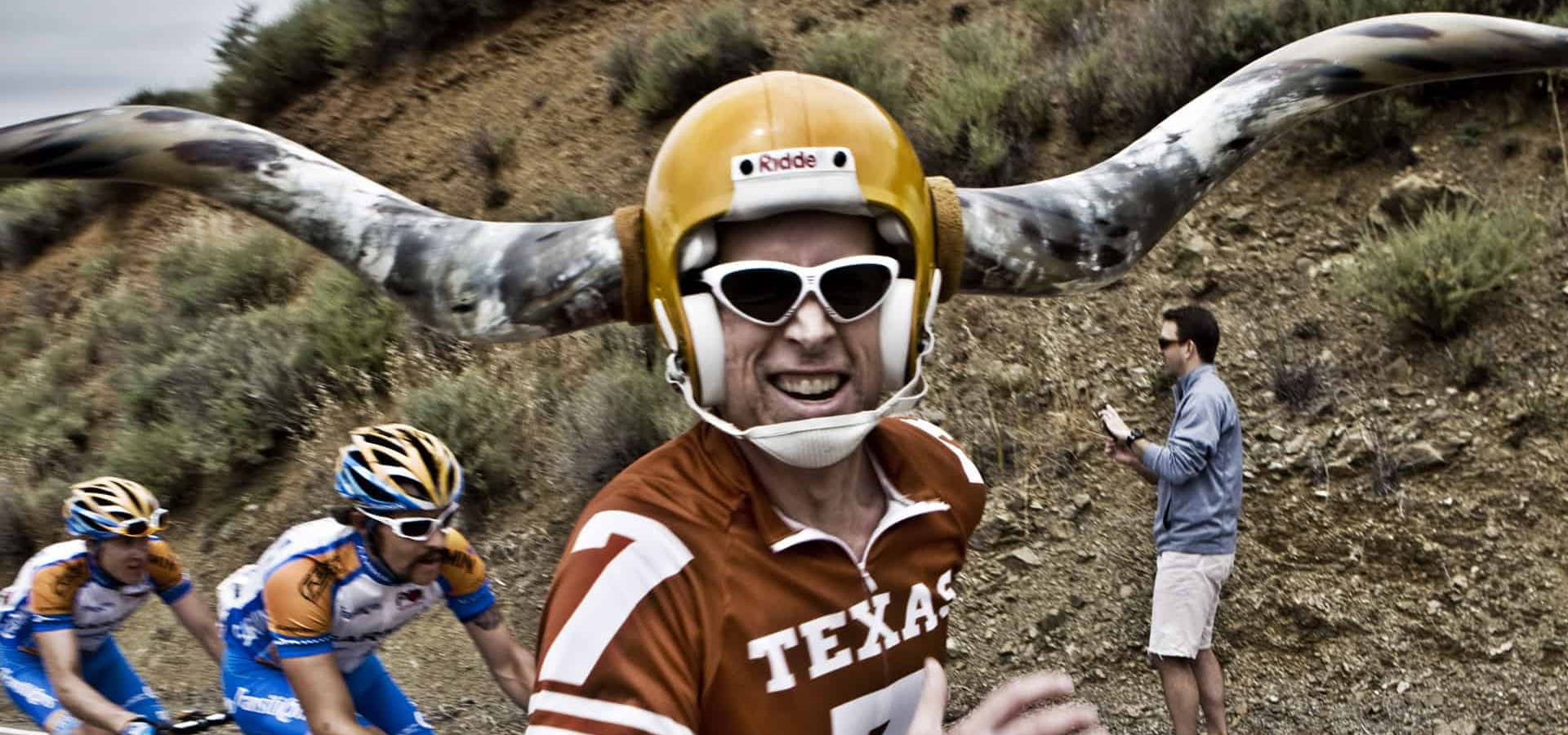 <p>I think this guy went to Texas! But he was everywhere. Somehow he would make it everyday to each stage. Roads are shut down hours before the entire race passes through. His helmet looked like it took out a couple of the riders in the past.</p>
